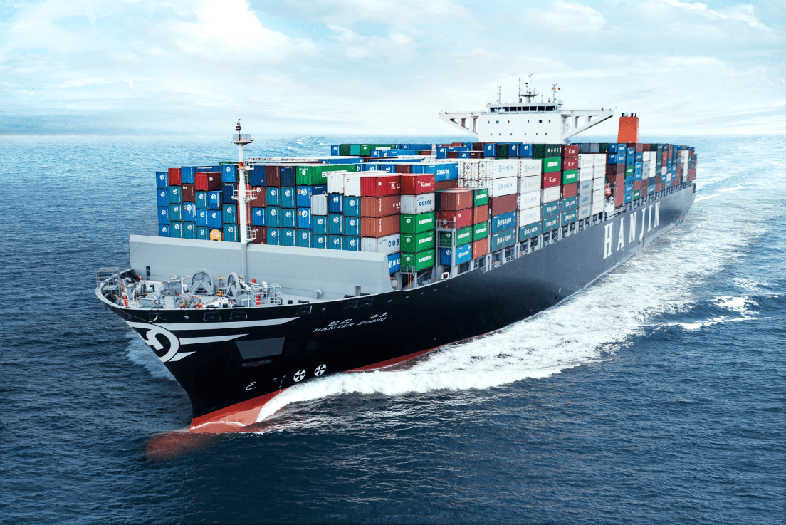 Container ship at sunset carrying export cargo